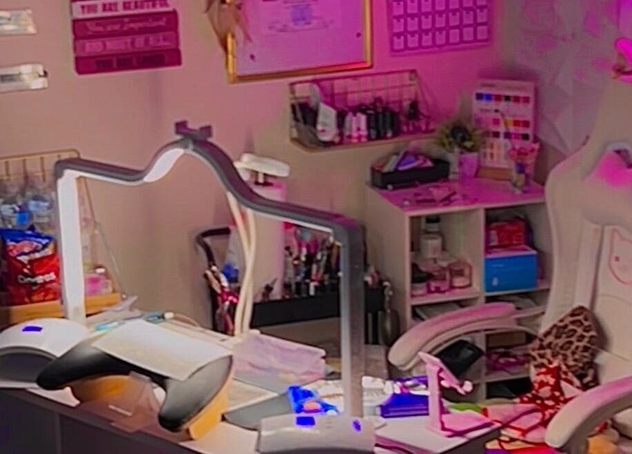 Cozy nail salon setup at Pearadise in Baltimore, Maryland, US, with plush chair and mood lighting.