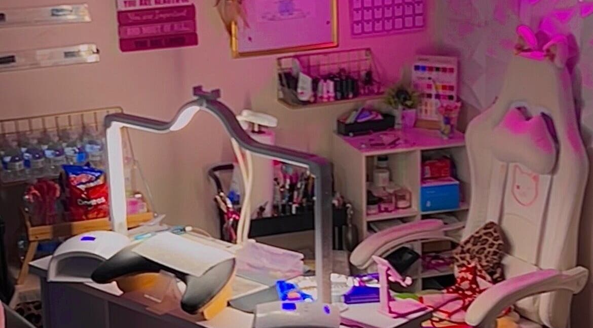 Cozy nail salon setup at Pearadise in Baltimore, Maryland, US, with plush chair and mood lighting.