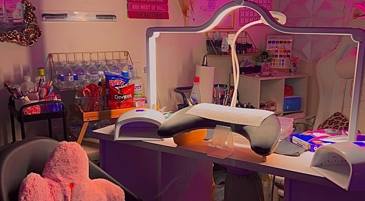 A cozy beauty station at Pearadise, Baltimore, Maryland, US, showcasing nail supplies and refreshments.