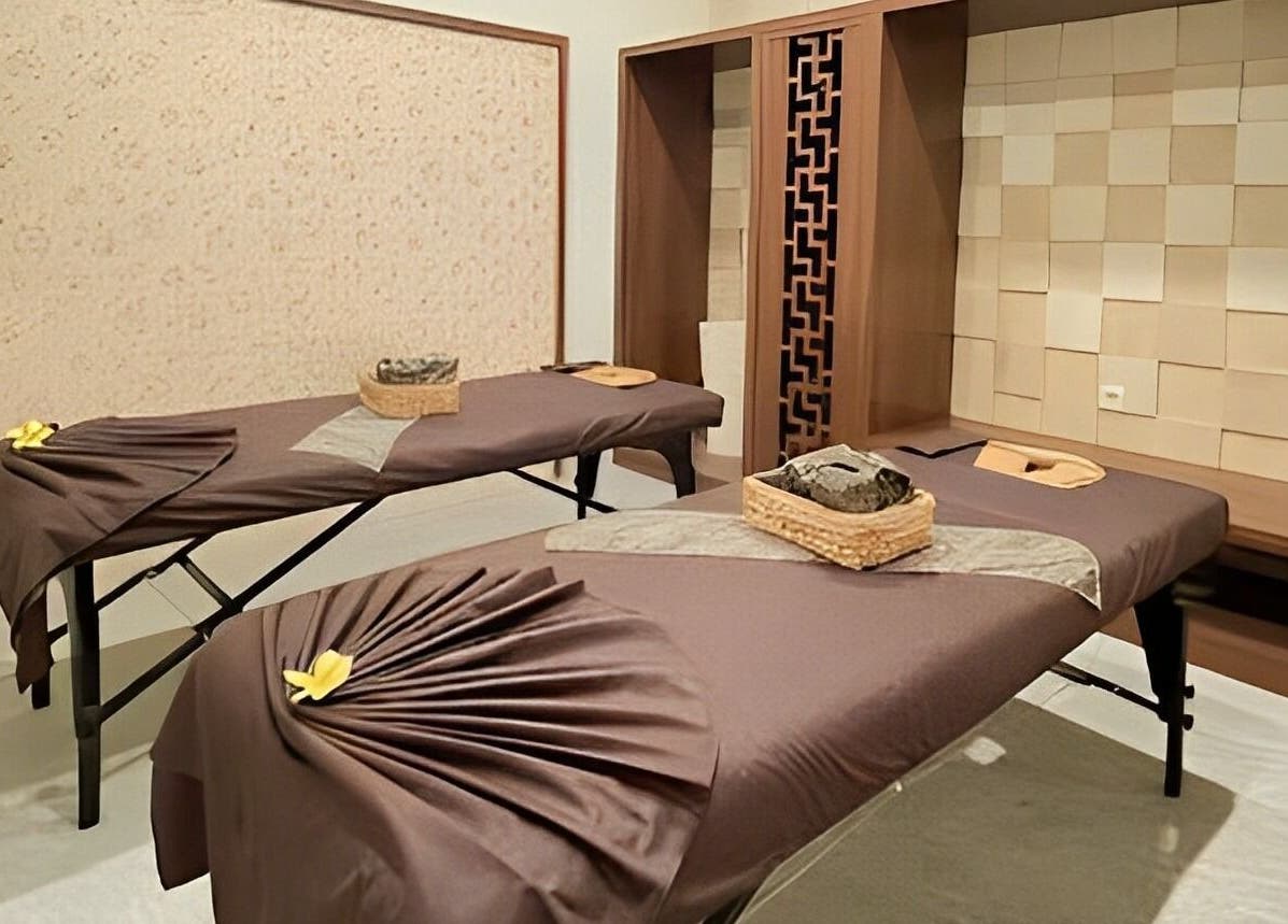Relaxing massage beds at Spa Central Jogja, Daerah Istimewa Yogyakarta, ID, showcasing peaceful ambiance.