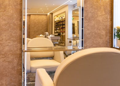 Chic interior of George Vallossian, London, England, GB with plush seating and stylish decor.