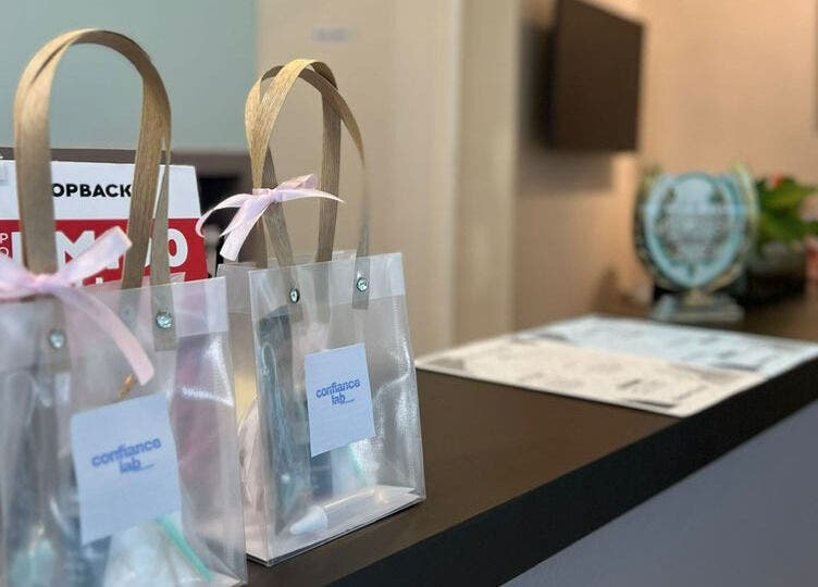 Gift bags displayed on the Confiance Lab counter in Tanjung Tokong, Pulau Pinang, MY, showcasing elegance.