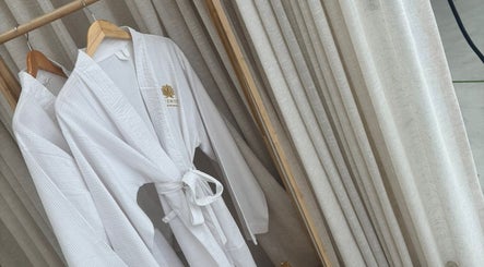 Elegant white robes at Chemist Aesthetics Liverpool, located in Liverpool, England, GB, showcasing spa luxury.