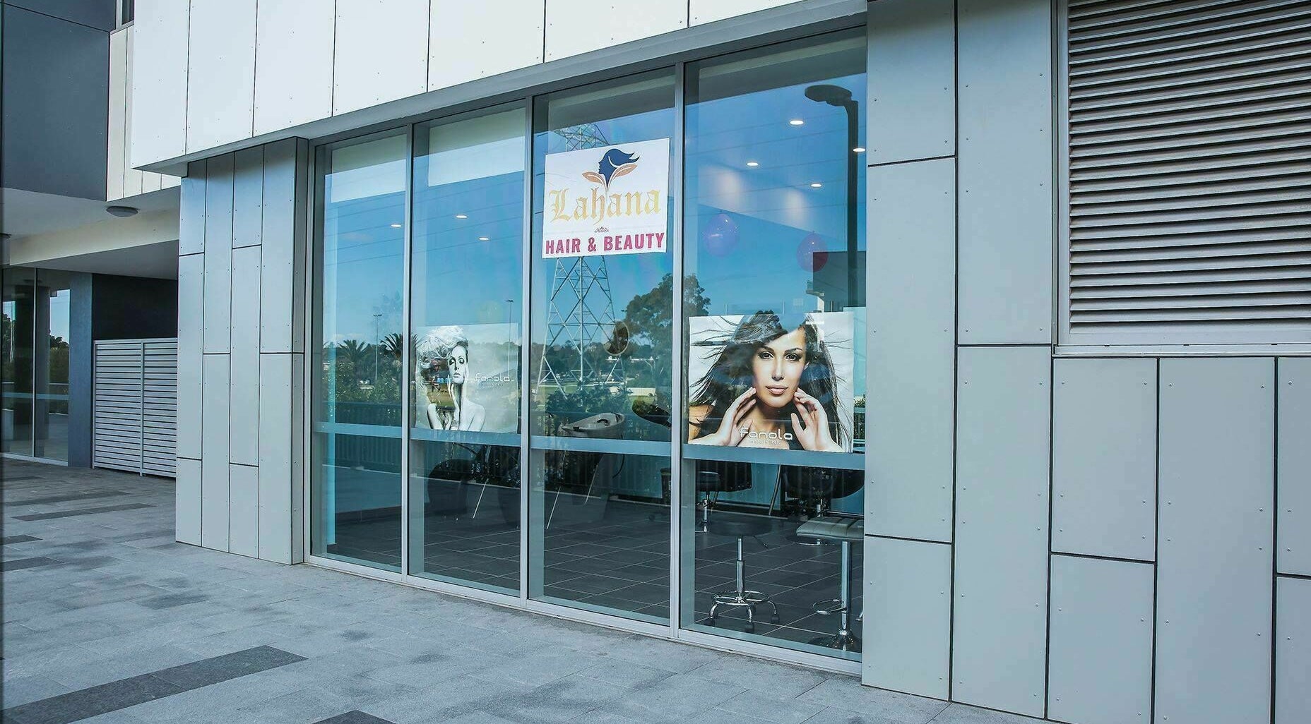 Exterior of Lahana Hair & Beauty in Canterbury, New South Wales, AU displaying stylish posters.