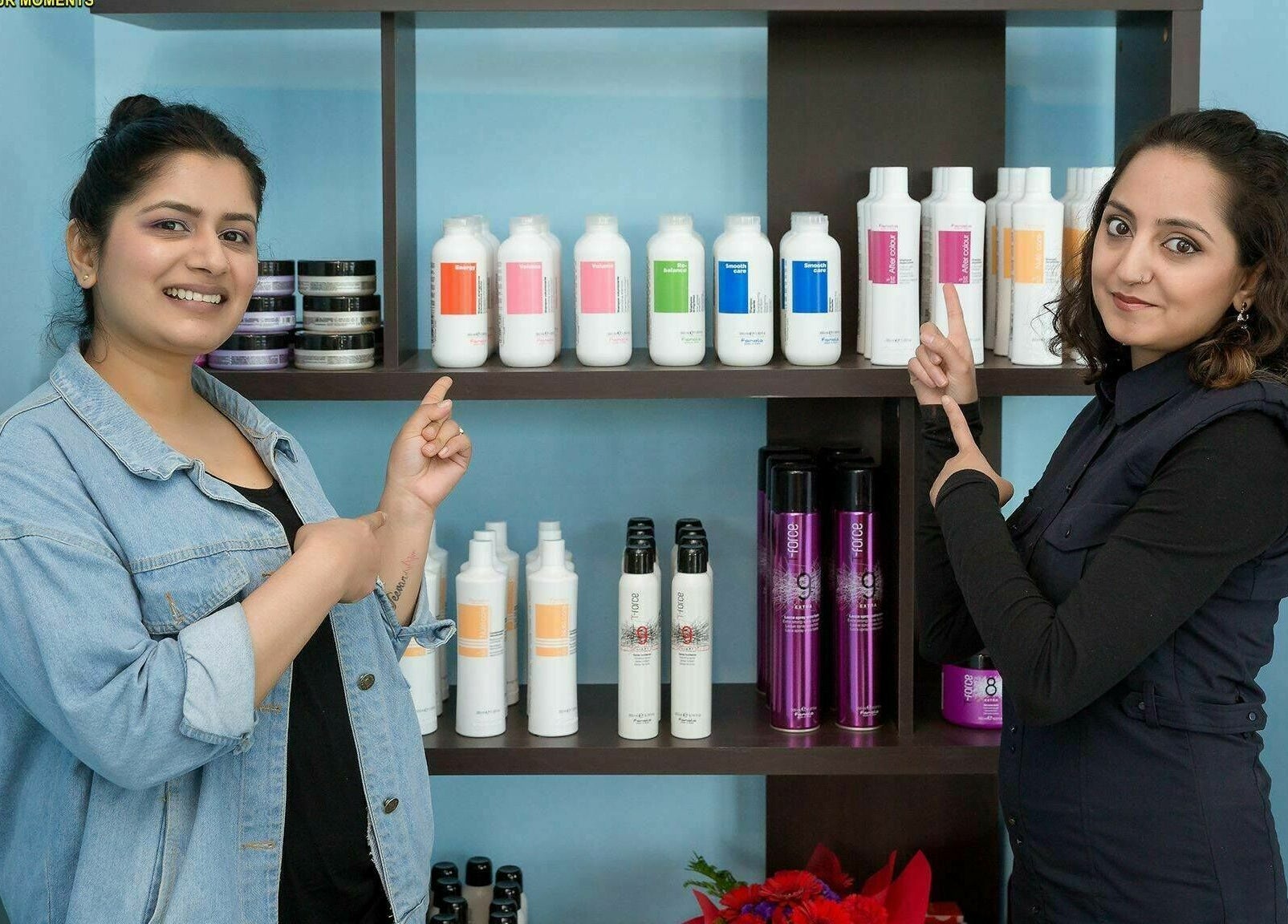 Two women showcasing hair products at Lahana Hair & Beauty, Canterbury, New South Wales, AU.