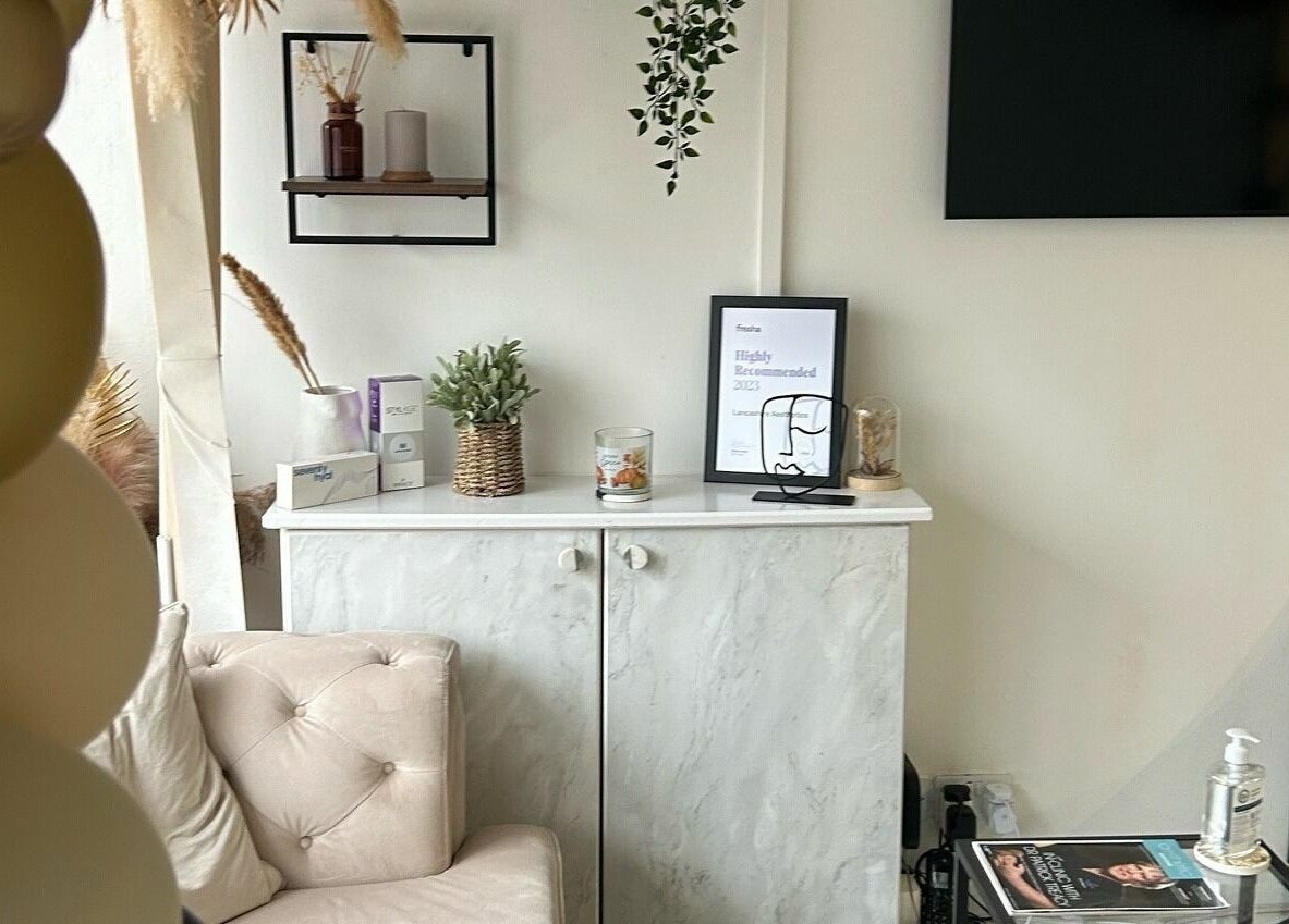 Stylish interior of RENU By Amber in Bamber Bridge, England, featuring elegant decor and a cozy seating area.