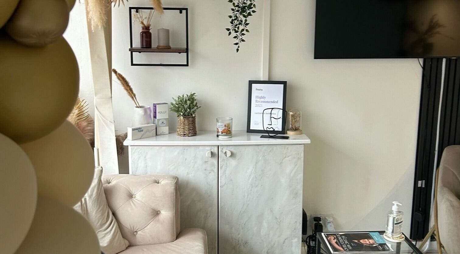 Stylish interior of RENU By Amber in Bamber Bridge, England, featuring elegant decor and a cozy seating area.