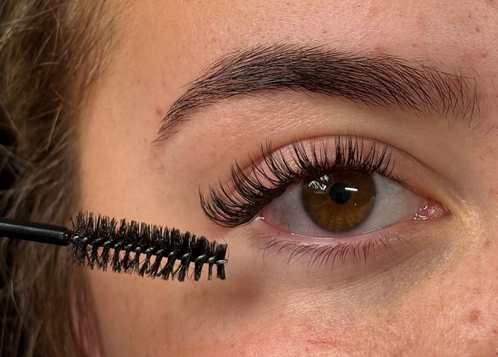 Close-up of eyelash extension process at The Glam Shack, Mawsley, England, GB.