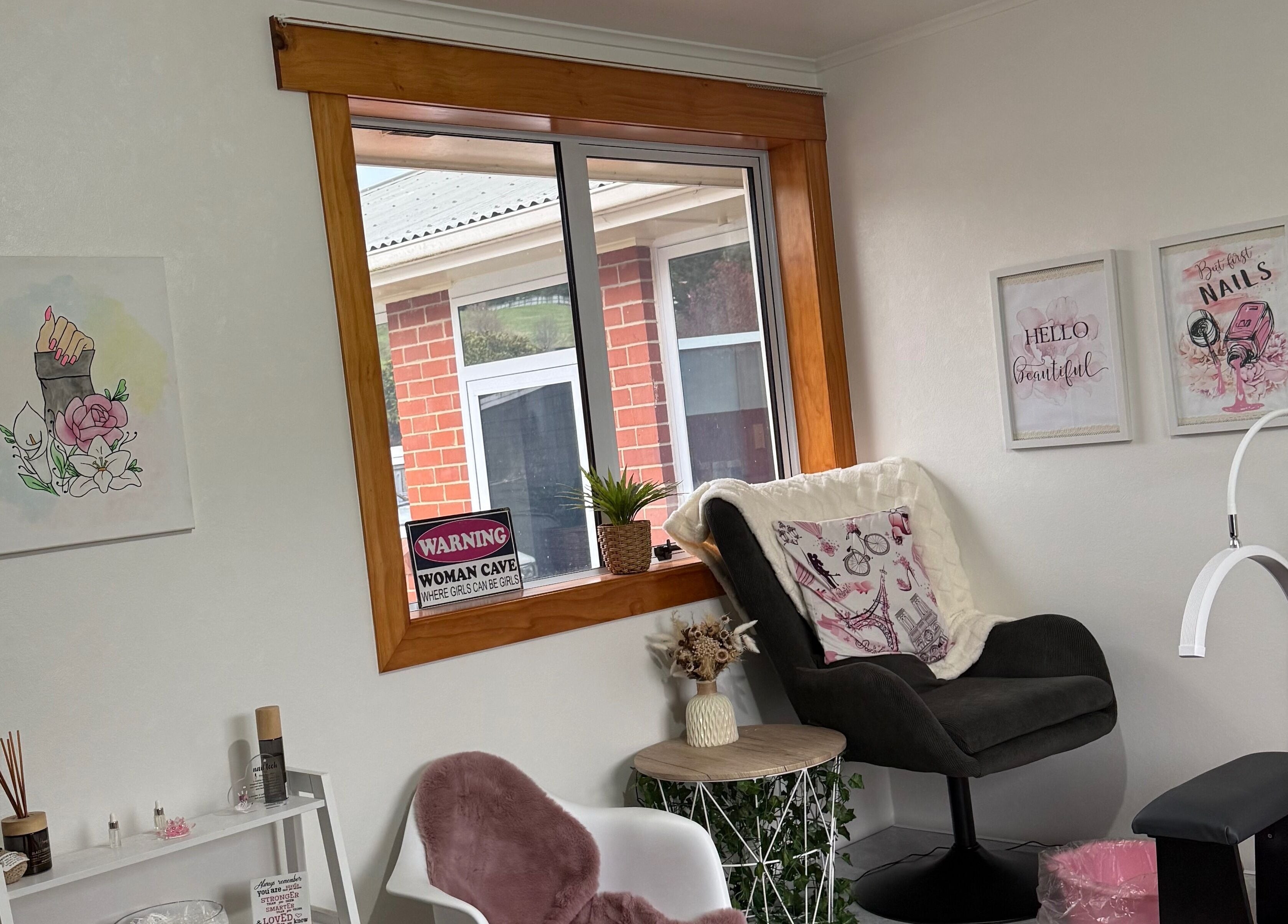 Modern interior of Blank Canvas Nails, Dunedin, Otago Region, NZ featuring chic decor and comfortable seating.