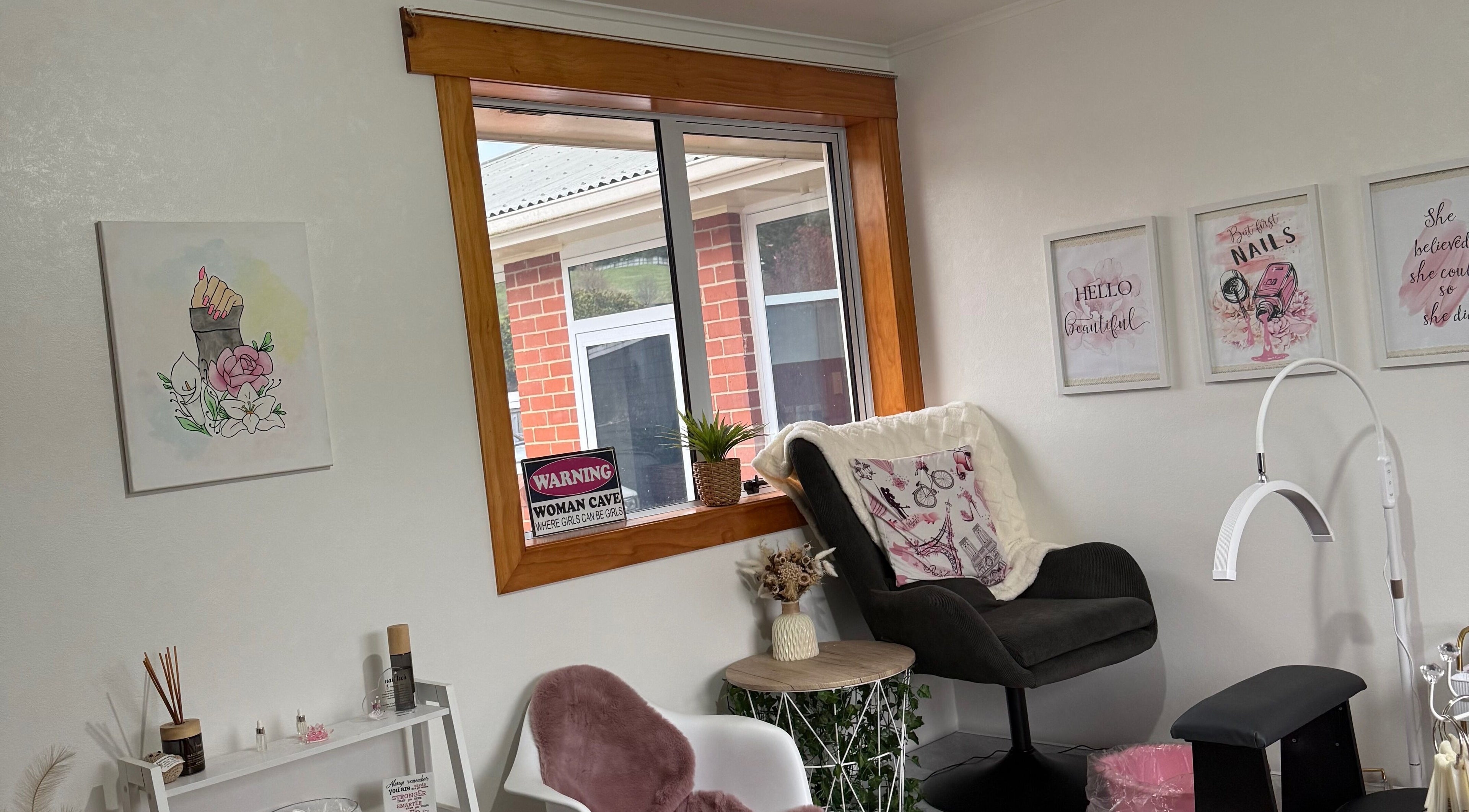 Modern interior of Blank Canvas Nails, Dunedin, Otago Region, NZ featuring chic decor and comfortable seating.