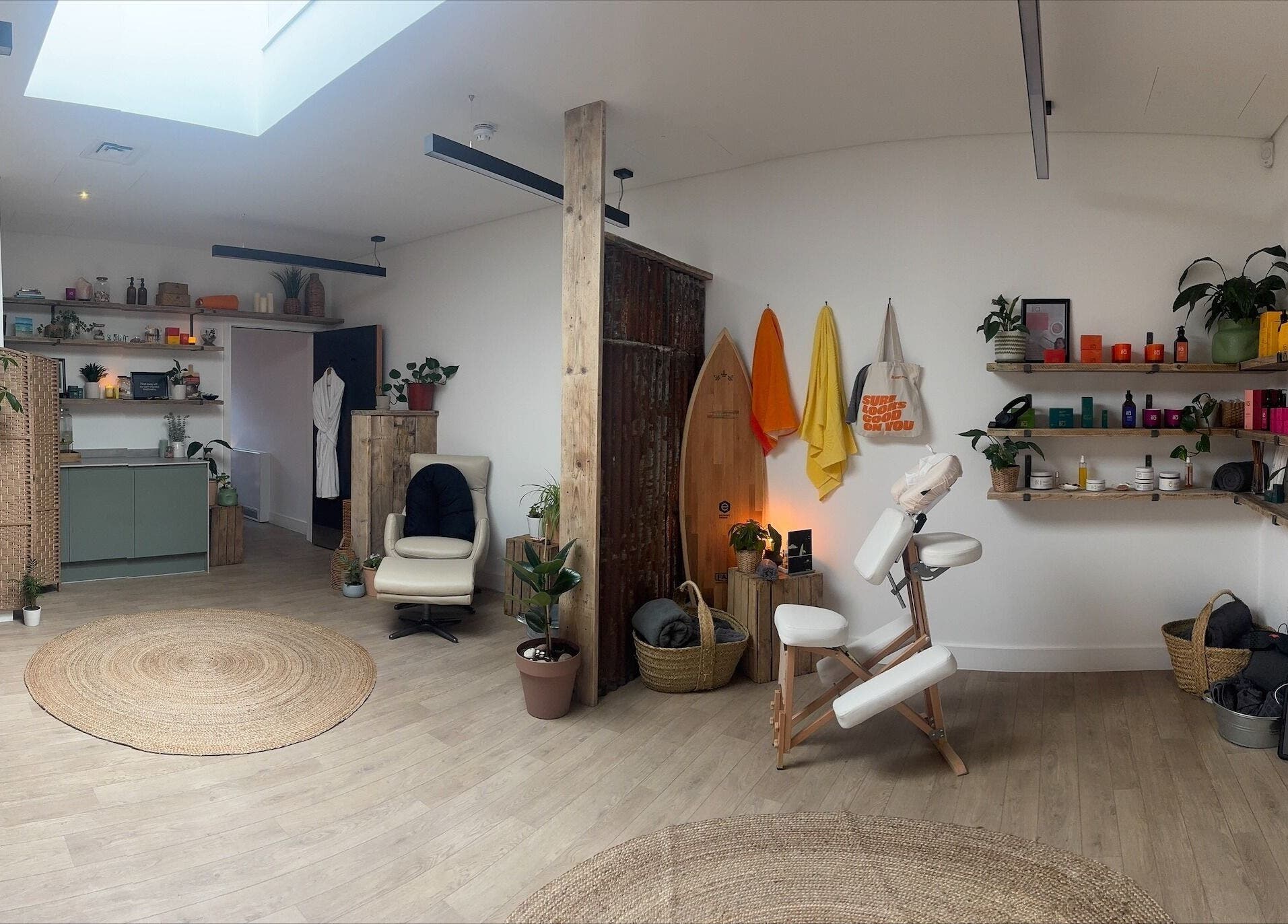 Cozy treatment room at Spa Studio by Lost Shore, Newbridge, Scotland, GB, featuring relaxing decor and wellness products.