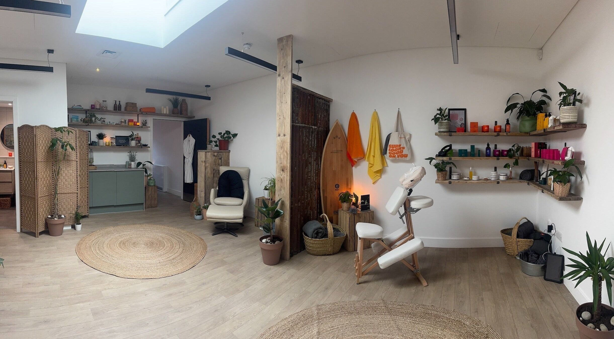 Relaxing interior of Spa Studio by Lost Shore in Newbridge, Scotland, GB featuring a cozy massage chair and wooden decor.