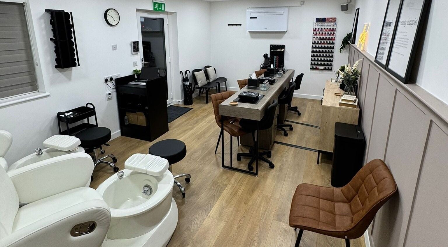 Chic interior of BN Beauty - Peacehaven in Peacehaven, England, GB showcasing elegant manicure and pedicure stations.
