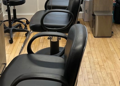 Chic salon chairs at Blowout Boulevard, New York, New York, US, showcasing modern elegance.
