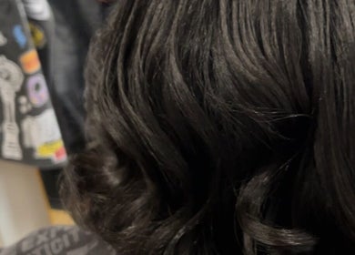 Close-up of styled dark hair at Blowout Boulevard, New York, New York, US.