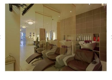 Luxurious salon interior at Adele@thetherapysuite, Inverness, Scotland, GB, showcasing plush seating and modern decor.