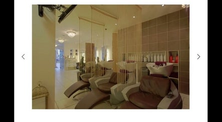Luxurious salon interior at Adele@thetherapysuite, Inverness, Scotland, GB, showcasing plush seating and modern decor.