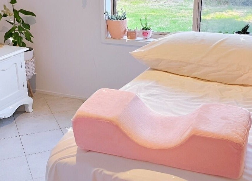 Cozy treatment room at Fairytale Lashes, Onkaparinga Heights, South Australia, AU, with a pink pillow and serene decor.