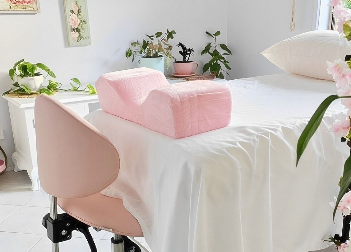 Relaxing treatment room at Fairytale Lashes in Onkaparinga Heights, South Australia, AU, featuring pink decor.