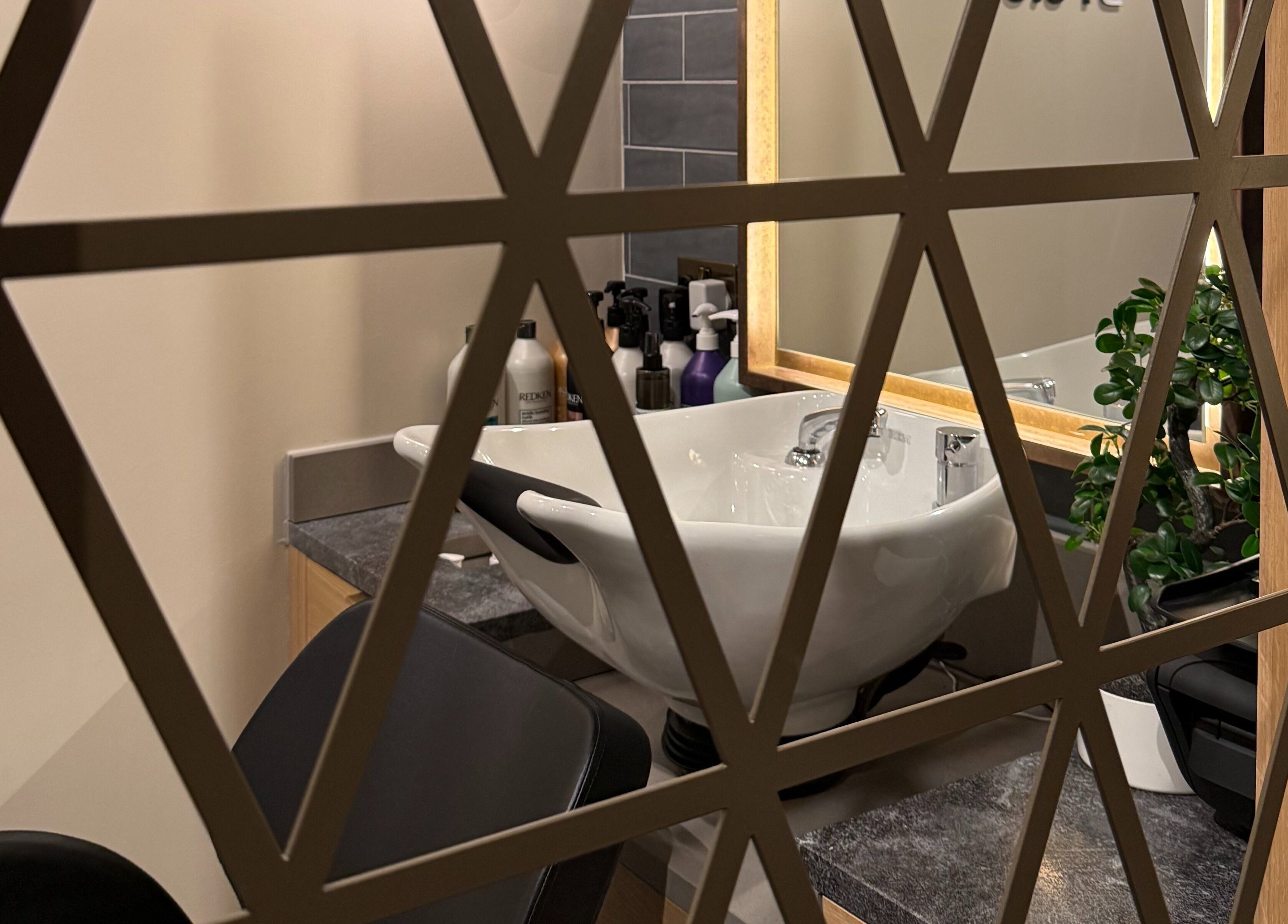 Chic salon sink area with modern decor at GLAZED By JC, Mottram, England, GB.