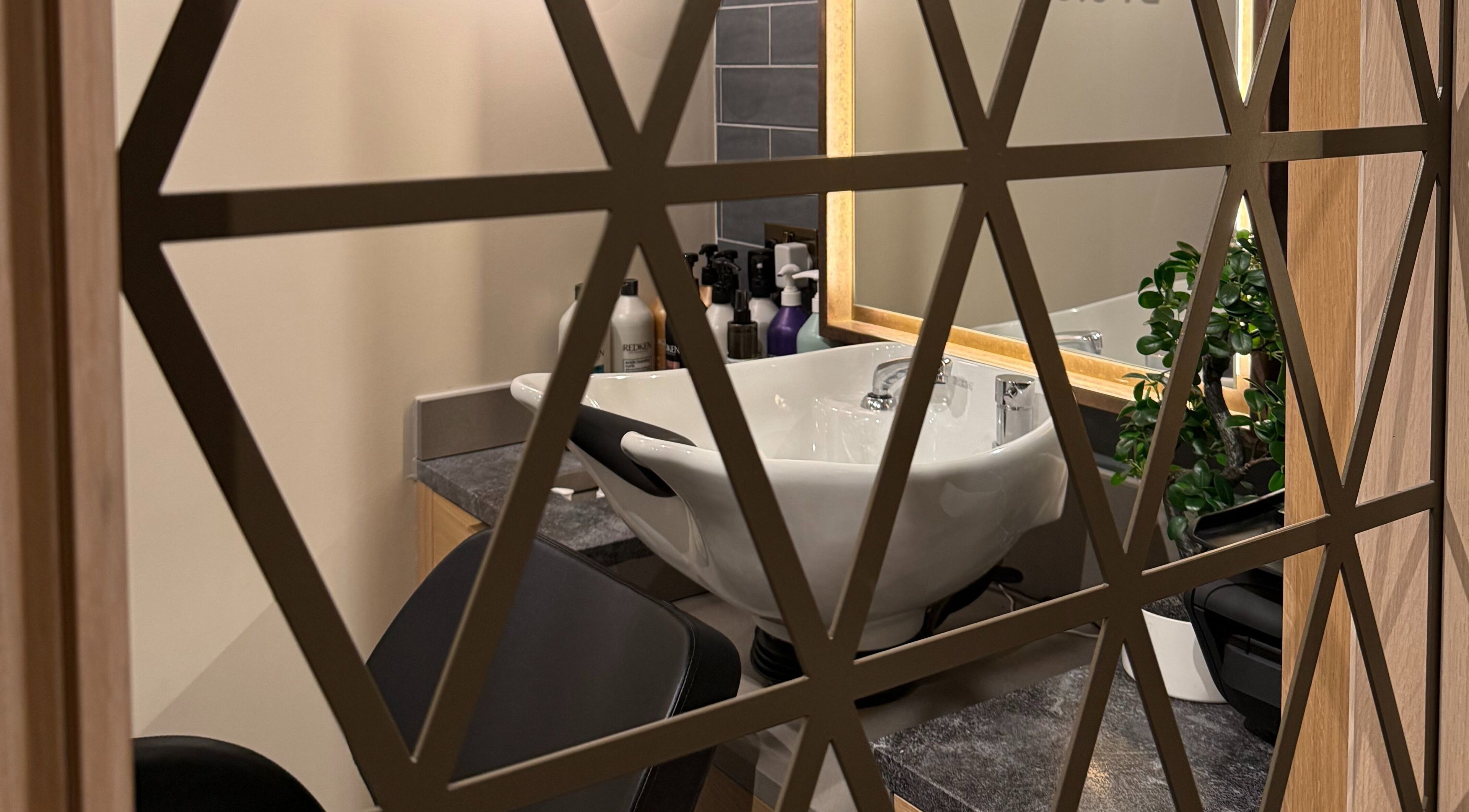 Chic salon sink area with modern decor at GLAZED By JC, Mottram, England, GB.