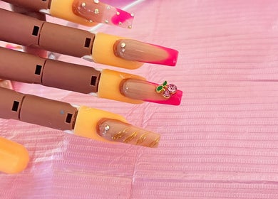 Vibrant nail designs on a mannequin hand at Bratz Klaws LC, Vieux Fort, Vieux Fort, LC.