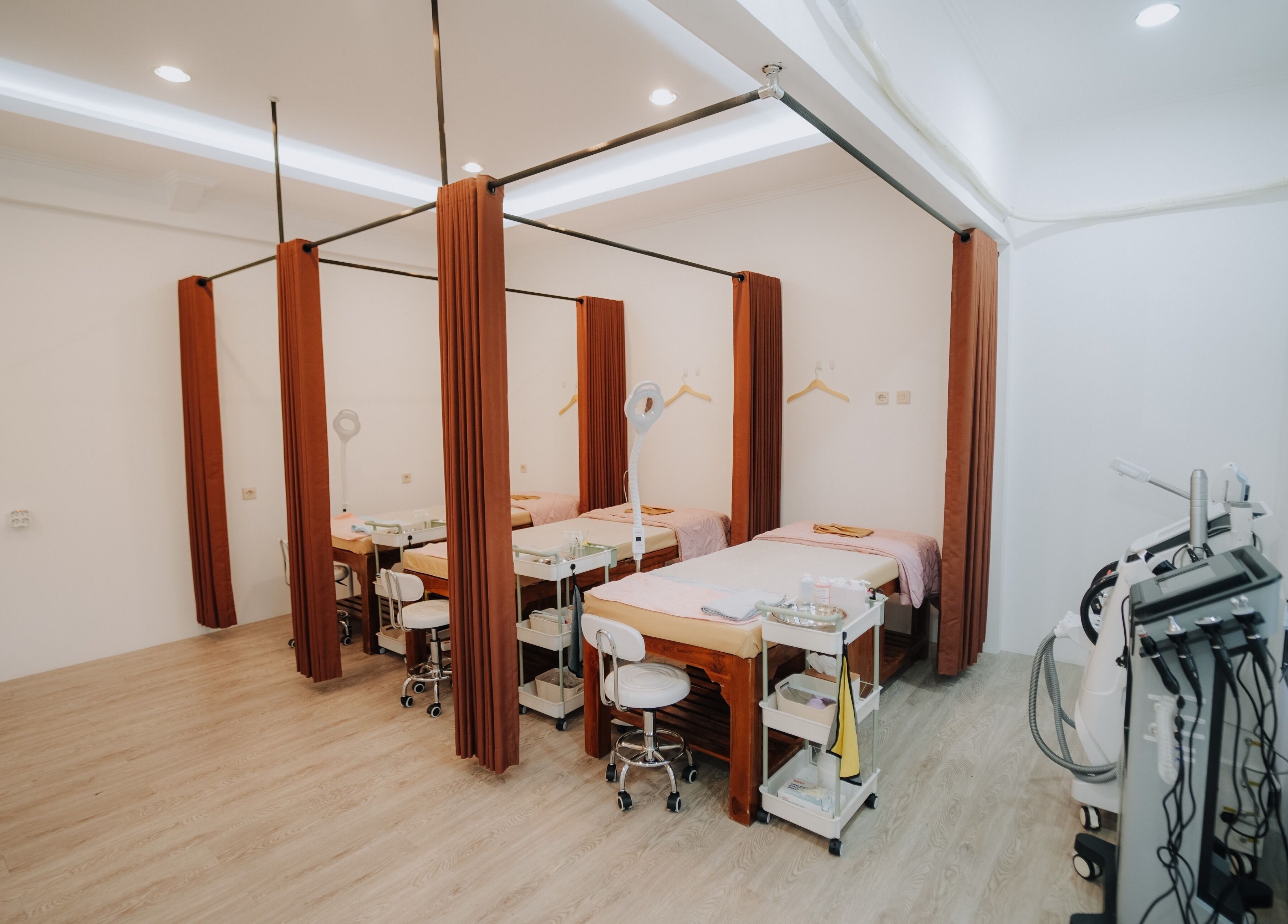 Cozy treatment rooms at Glow In Beauty Studio in Bali, Bali, ID, featuring spa beds and equipment for relaxation.