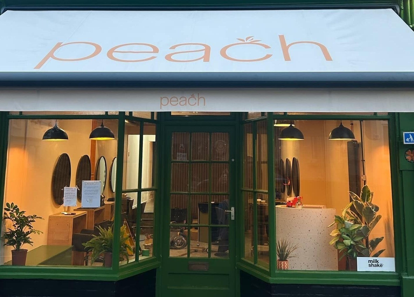 Peach 37 salon exterior in Exeter, England, GB, showcasing inviting decor and elegant atmosphere.