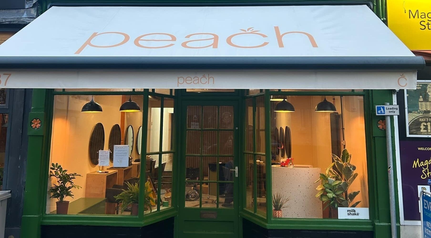 Peach 37 salon exterior in Exeter, England, GB, showcasing inviting decor and elegant atmosphere.