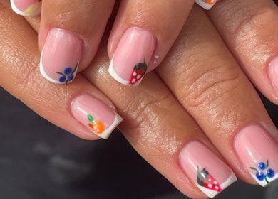 Colorful fruit nail art design at BySammieJo, Rainham, England, GB showcasing strawberries and berries.