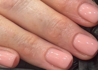 Elegant pink nails crafted at BySammieJo, Rainham, England, GB, showcasing a glossy, professional finish.