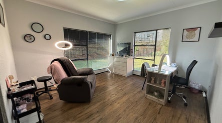 Cozy beauty treatment room at Blush and Blossom Aesthetics PTY LTD in Roodepoort, Gauteng, ZA with elegant decor.