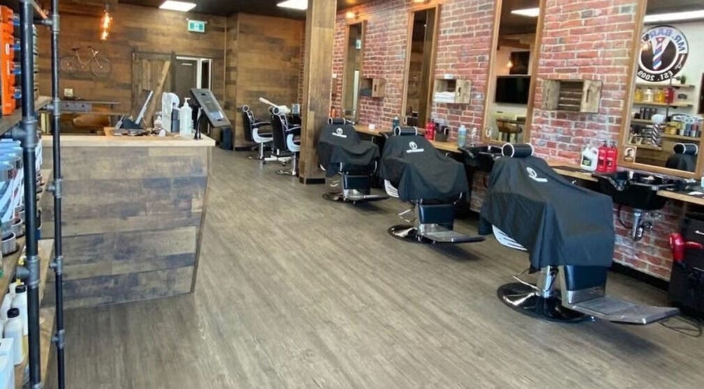 Interior of Mr. Barber St. Albert with rows of barber chairs in St. Albert, Alberta, CA.
