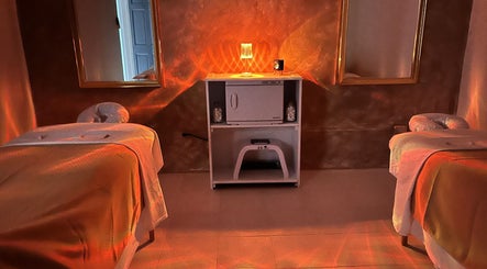 Tranquil treatment room at Three Sisters Spa And Beauty Center, Long Bay West End, AI. Relaxing ambiance.