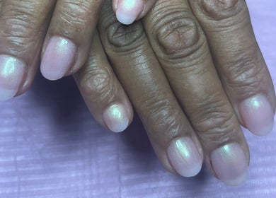 Elegant shimmering nails at Nailphoria Beauty, Leeds, England, GB showcase exquisite nail artistry.