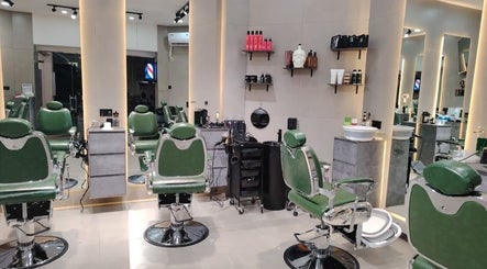 Modern salon interior at 8088 Express - Al Jaffiliya, Dubai, AE with green chairs and mirrored walls.