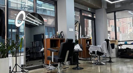 Modern salon interior at Korner Seoul, Seoul. Stylish chairs and mirrors enhance the cozy space at 서울특별시, KR.