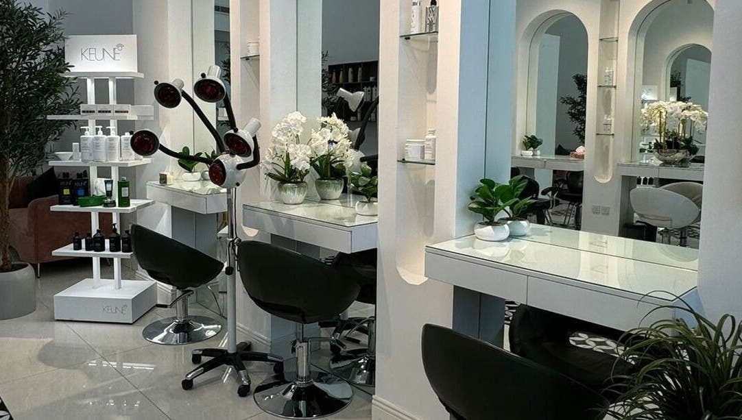 Chic interior of Luna Noor Salon in Riyadh, Riyadh Province, SA, featuring modern styling stations and lush decor.