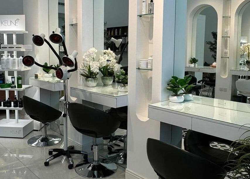 Chic interior of Luna Noor Salon in Riyadh, Riyadh Province, SA, featuring modern styling stations and lush decor.