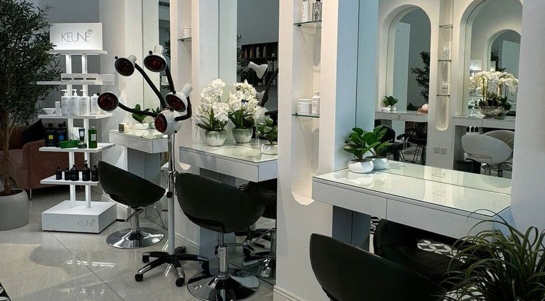 Chic interior of Luna Noor Salon in Riyadh, Riyadh Province, SA, featuring modern styling stations and lush decor.