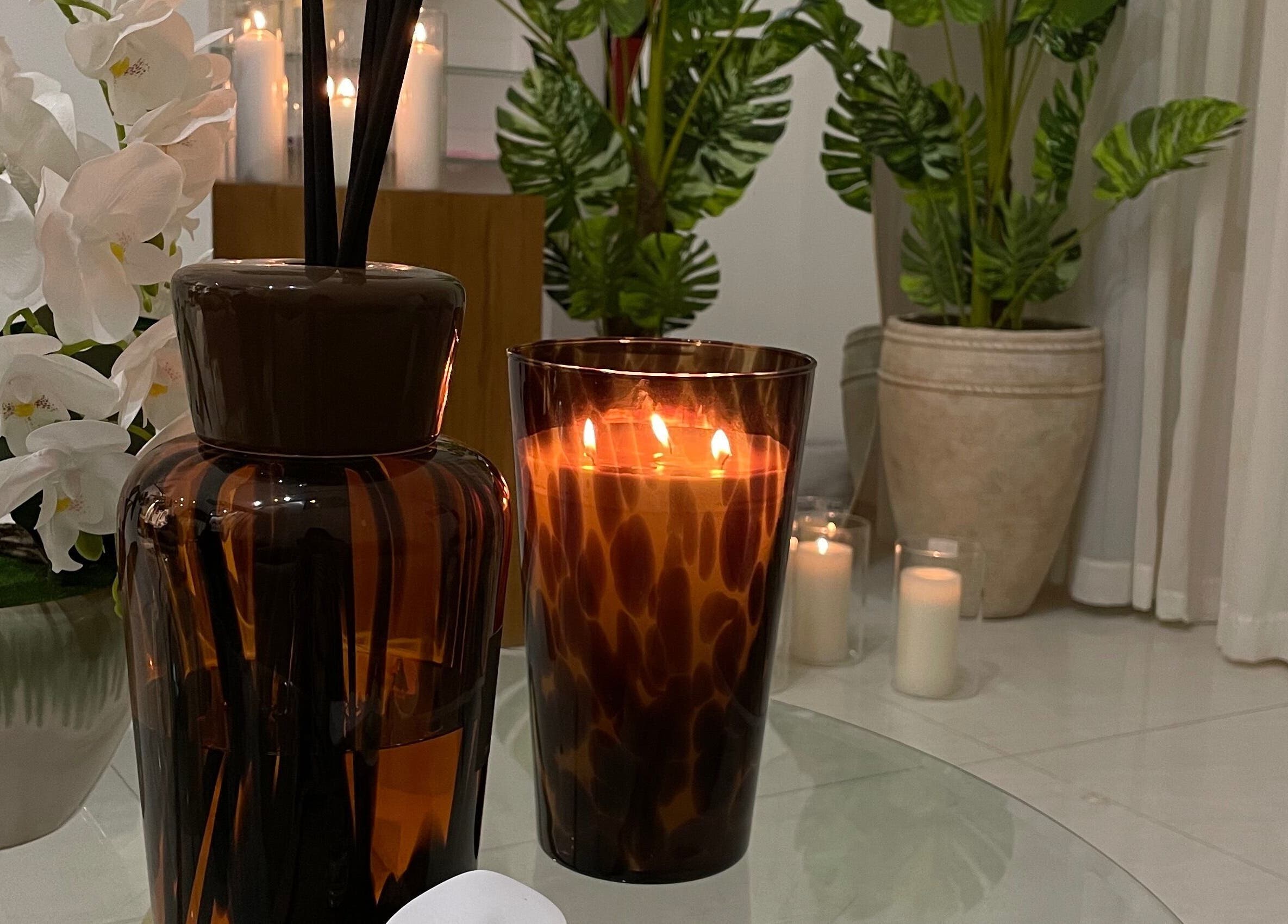 Elegant spa setting with candles and orchids at Luna Noor Salon, Riyadh, Riyadh Province, SA.