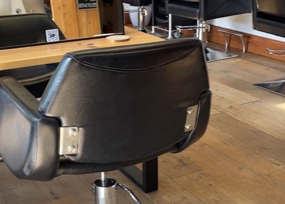 Luxurious salon chair at Bavaro, Aldwincle, England, GB, offering a premium beauty experience.