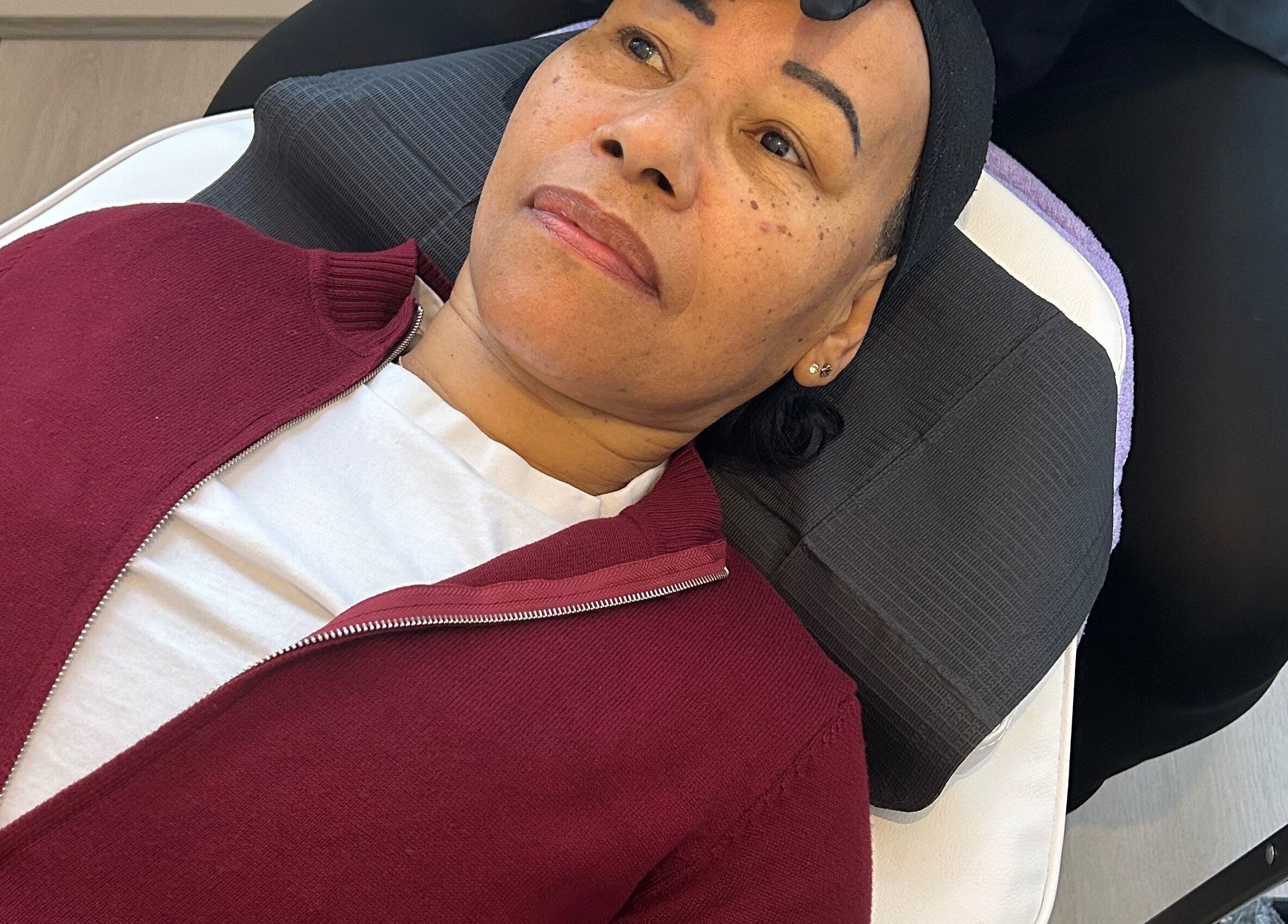 Client receiving a facial treatment at Timeless Beauty by Mel in Gravesend, England, GB.