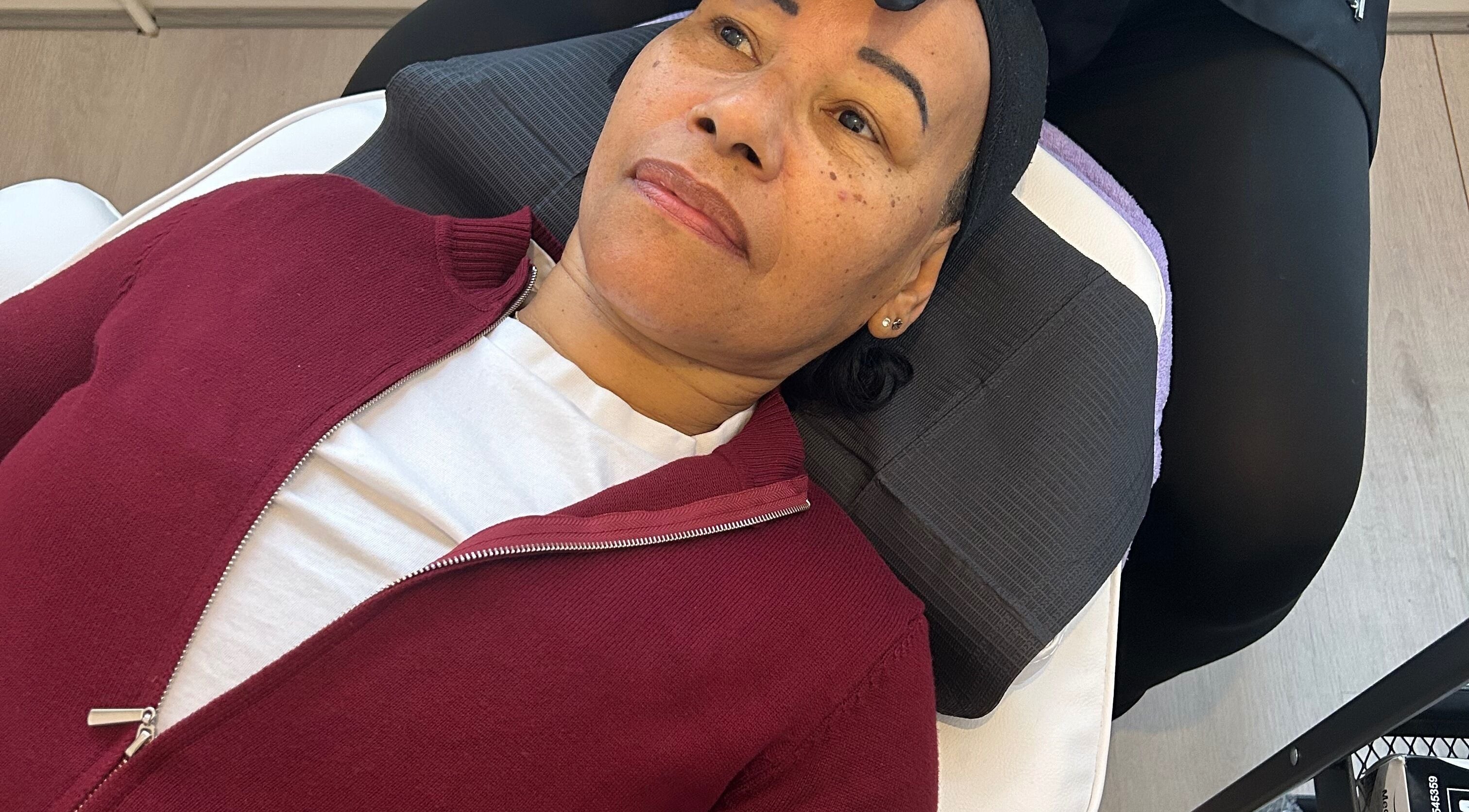 Client receiving a facial treatment at Timeless Beauty by Mel in Gravesend, England, GB.