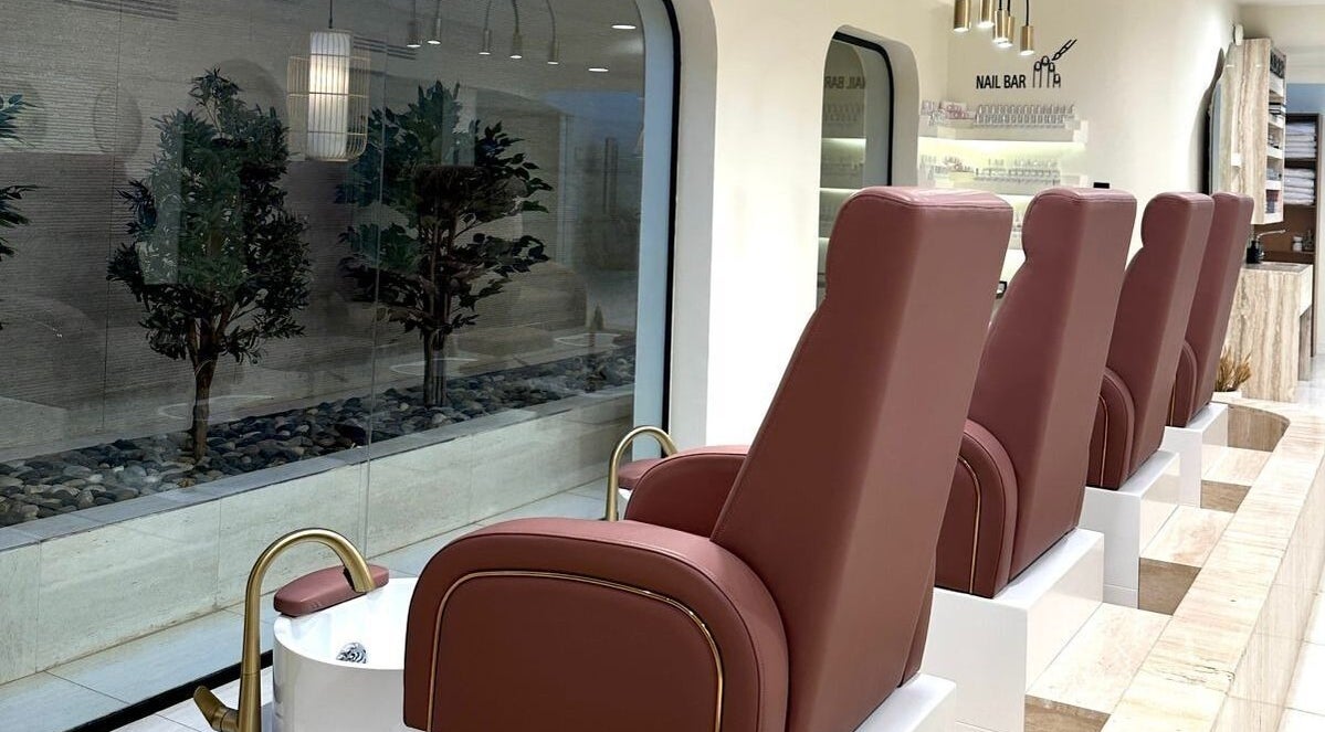 Plush pedicure chairs at Alm beauty lounge, Riyadh, Riyadh Province, SA. A luxurious nail care space.