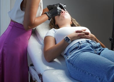 Eyebrow treatment at Sandra Faria Beauty in Hudson, Massachusetts, US. A client relaxes during a session.