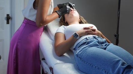 Eyebrow treatment at Sandra Faria Beauty in Hudson, Massachusetts, US. A client relaxes during a session.