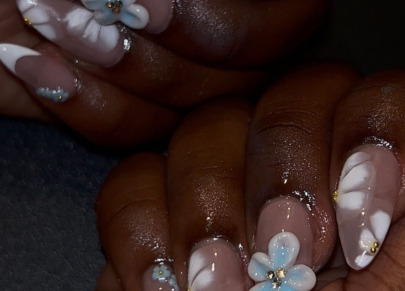 Intricate floral nail art by Nailzbyshaeimani in Kingston, St. Andrew Parish, JM, showcasing detailed craftsmanship.