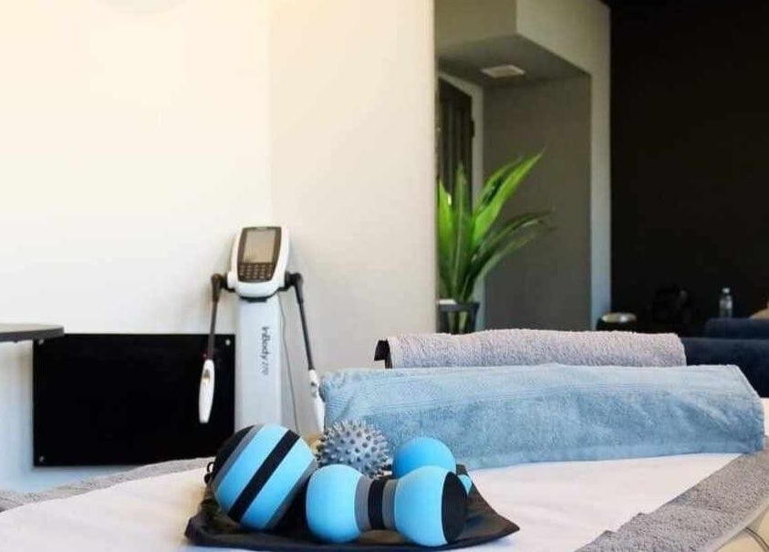 Serene therapy room at Active plus therapy by Saule, Glasgow, Scotland, GB, with equipment and plants.