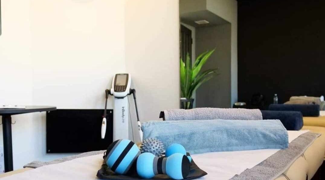 Serene therapy room at Active plus therapy by Saule, Glasgow, Scotland, GB, with equipment and plants.